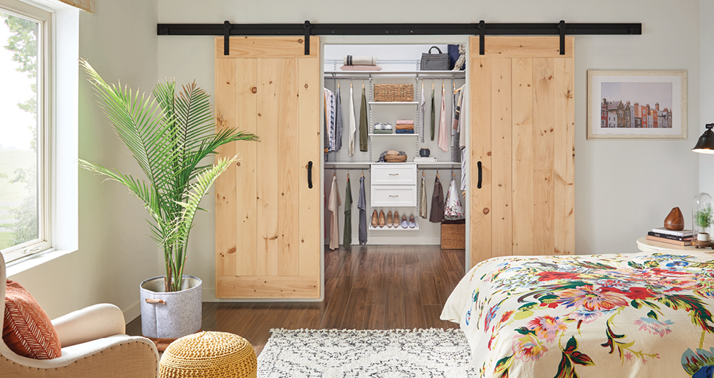 When your bedroom closet is this pretty and this well organized, you can leave the doors open.  Explore ShelfTrack EVO. 
