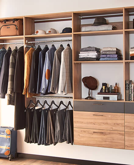 Wood Cabinets and Shelving in a Walk-in Closet