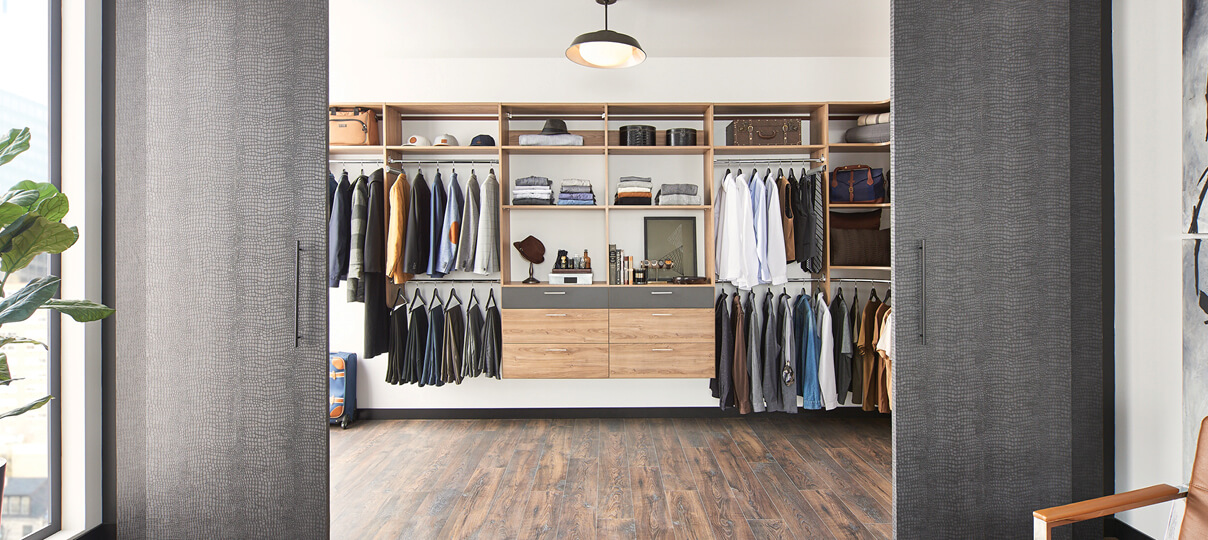 A masculine closet starts with the finishes. MasterSuite 27th Avenue has six colorways that can be mixed and matched for a custom look and feel.  Read all about MasterSuite 27th Avenue. 